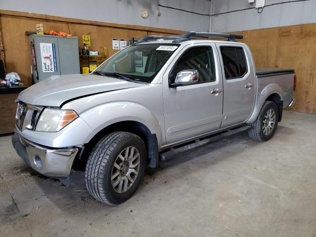 1N6AD0EV2AC435628 - 2010 NISSAN FRONTIER CREW CAB SE SILVER photo 1