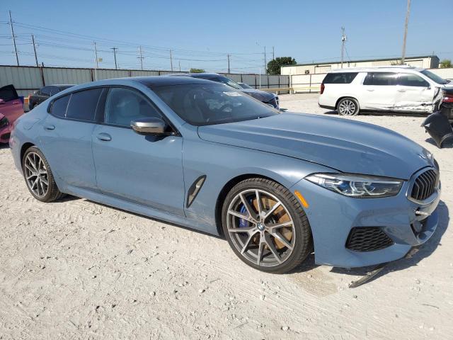 WBAGV8C08NCK07510 - 2022 BMW M850XI BLUE photo 4