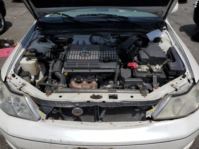 4T1BF28B0YU030382 - 2000 TOYOTA AVALON XL WHITE photo 11