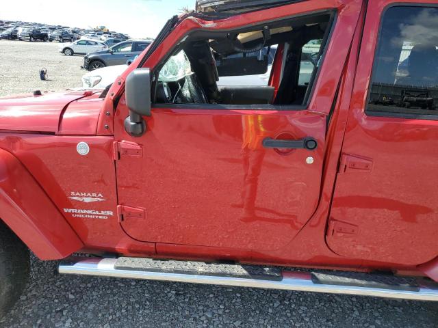 1J4BA5H17BL500863 - 2011 JEEP WRANGLER U SAHARA RED photo 7