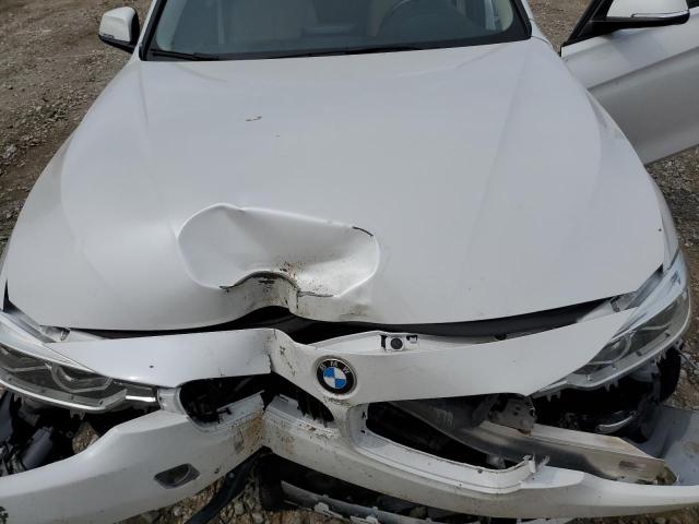 WBA8E5G51JNU47005 - 2018 BMW 320 XI WHITE photo 11