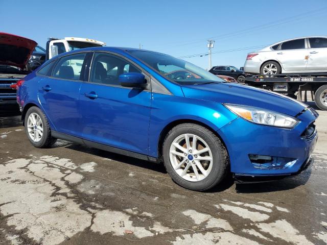 1FADP3F28JL256562 - 2018 FORD FOCUS SE BLUE photo 4