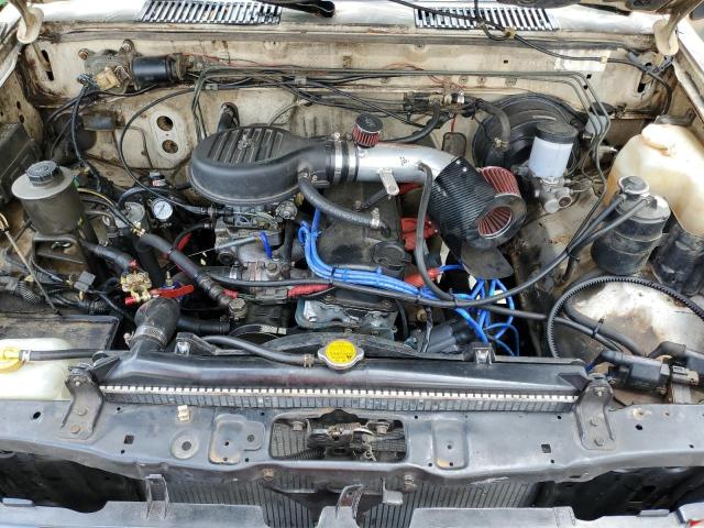 1N6ND11Y9GC422312 - 1986 NISSAN D21 SHORT BED TWO TONE photo 11