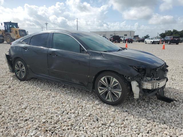 2HGFC1F74HH638269 - 2017 HONDA CIVIC EXL შავი ფოტო 4