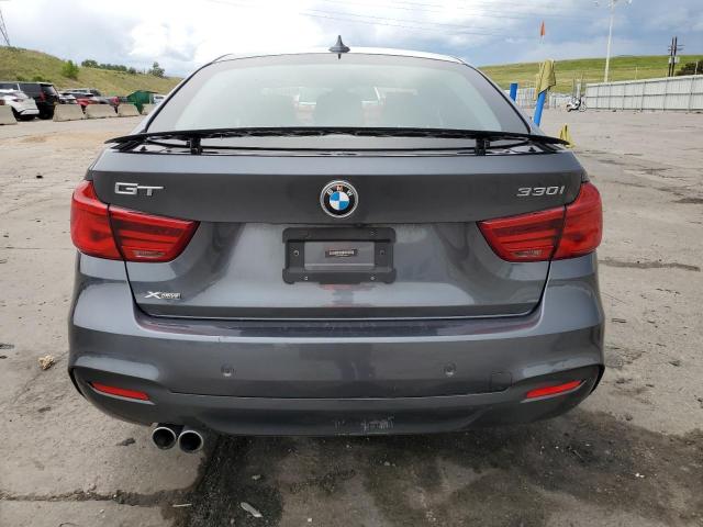 WBA8Z9C52JG828173 - 2018 BMW 330 XIGT CHARCOAL photo 6