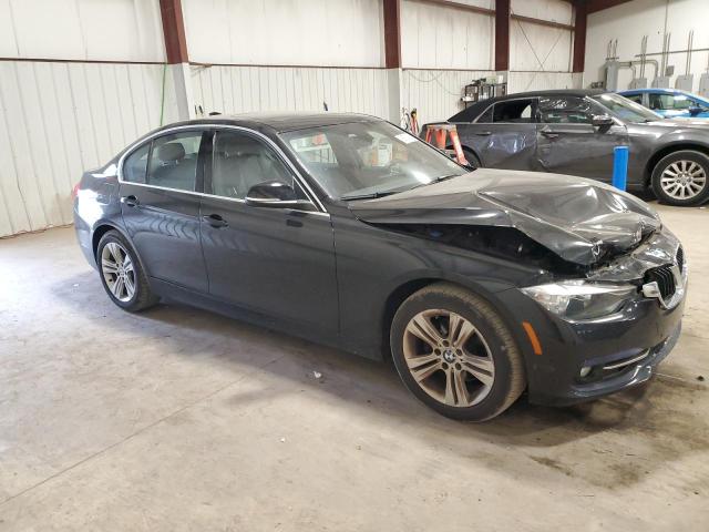 WBA8D9G50HNT90932 - 2017 BMW 330 XI Czarny zdjęcie 4