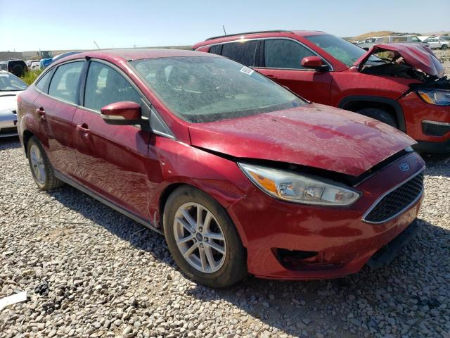 1FADP3F24FL262687 - 2015 FORD FOCUS SE BURGUNDY photo 4