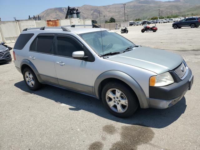 1FMZK02115GA78093 - 2005 FORD FREESTYLE SEL SILVER photo 4