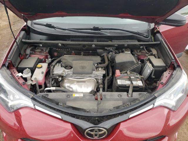 2T3BFREV1JW826370 - 2018 TOYOTA RAV4 LE RED photo 11