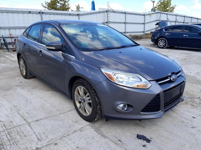 1FAHP3H2XCL472611 - 2012 FORD FOCUS SEL GRAY photo 1