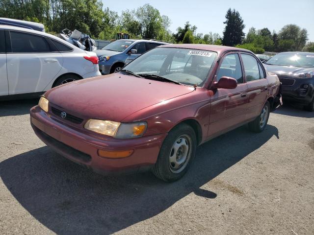 1NXBA02E7VZ605580 - 1997 TOYOTA COROLLA BASE MAROON photo 1