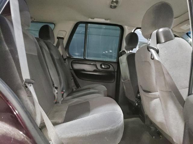 1GKDT13S482112414 - 2008 GMC ENVOY أرجواني صورة 11