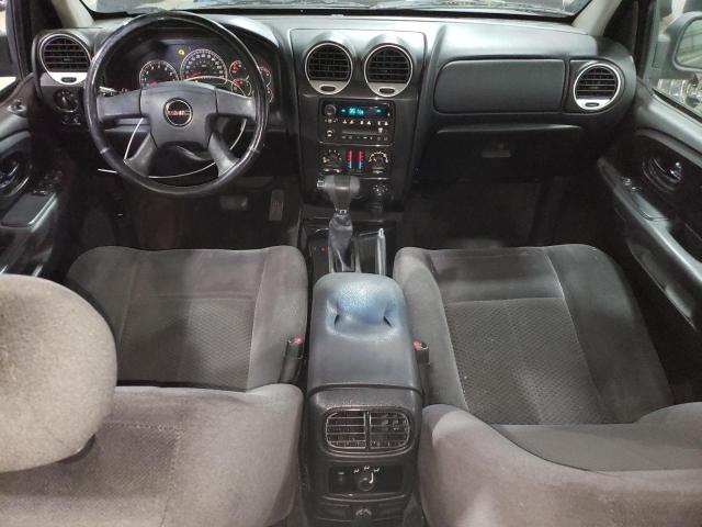 1GKDT13S482112414 - 2008 GMC ENVOY أرجواني صورة 8