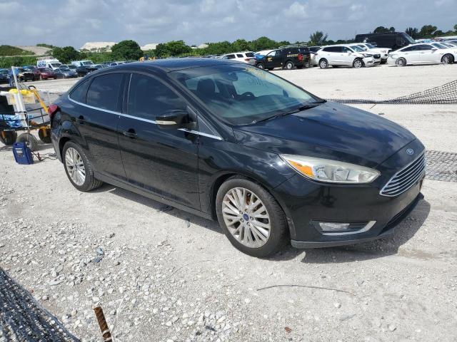 1FADP3J23HL228069 - 2017 FORD FOCUS TITANIUM BLACK photo 4