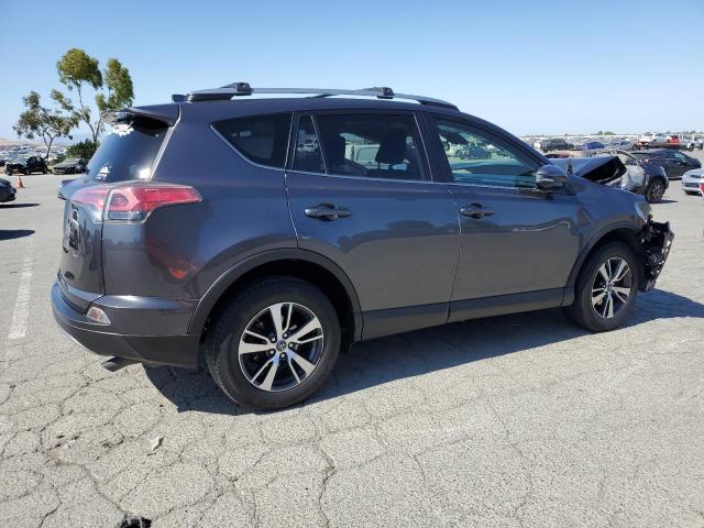 JTMWFREV7HJ710665 - 2017 TOYOTA RAV4 XLE CHARCOAL photo 3