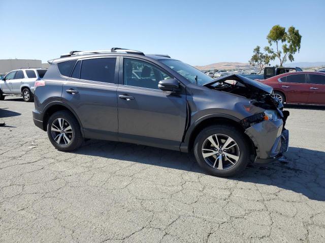 JTMWFREV7HJ710665 - 2017 TOYOTA RAV4 XLE CHARCOAL photo 4