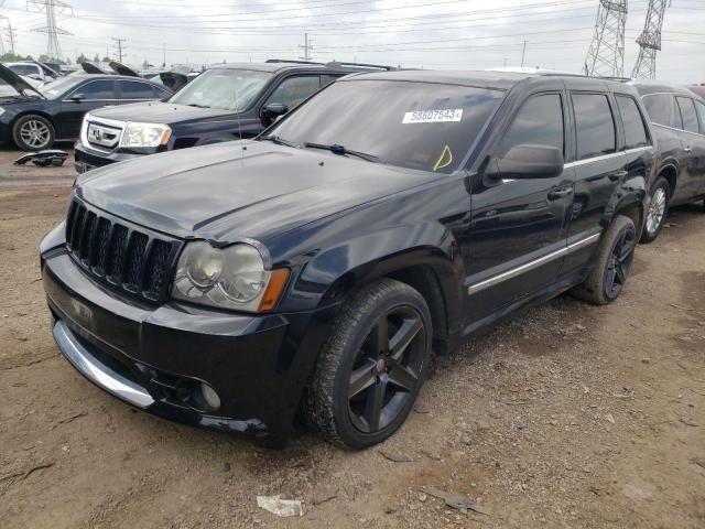 1J8HR78307C556245 - 2007 JEEP GRAND CHER SRT-8 BLACK photo 1