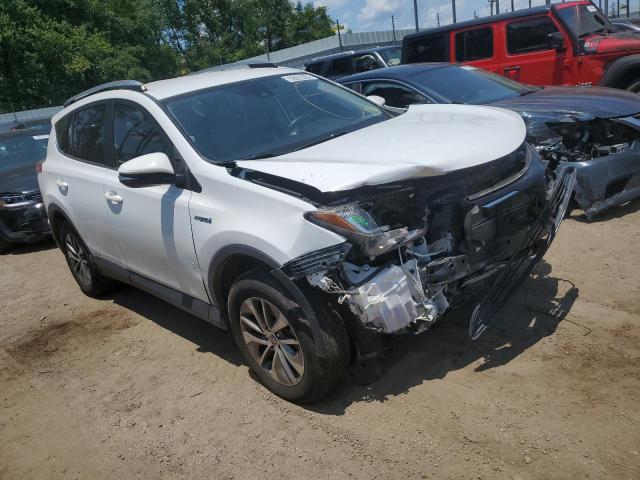 JTMRJREV1JD203650 - 2018 TOYOTA RAV4 HV LE WHITE photo 4