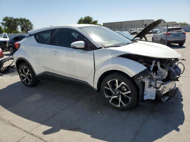 NMTKHMBX9JR052629 - 2018 TOYOTA C-HR XLE WHITE photo 4