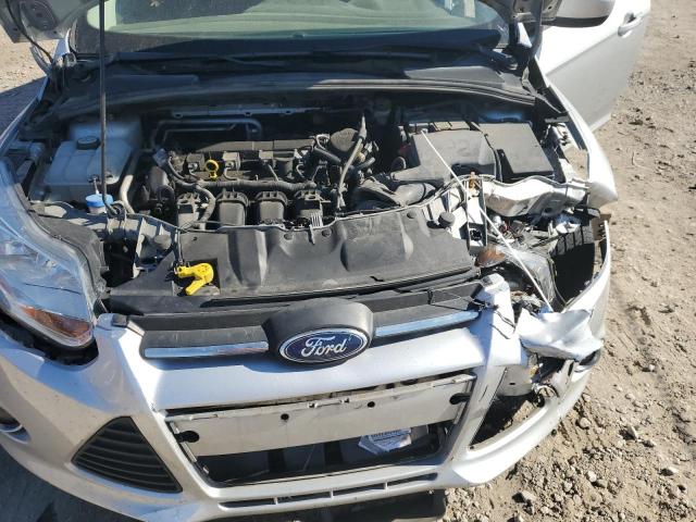 1FAHP3F25CL256233 - 2012 FORD FOCUS SE SILVER photo 11