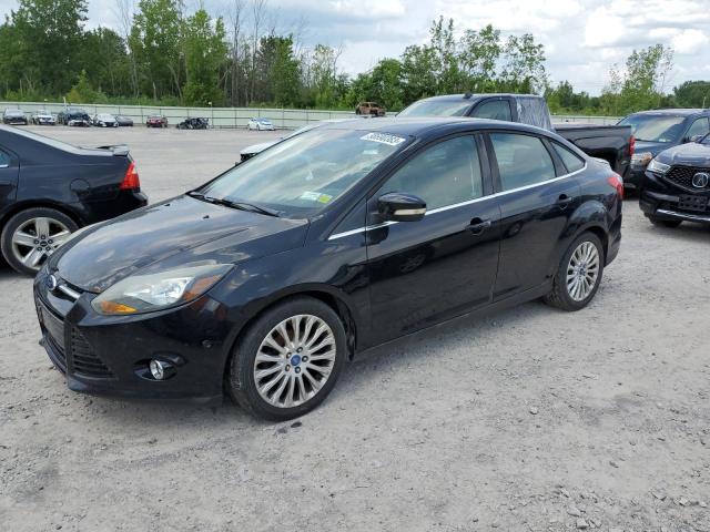 1FAHP3J29CL223453 - 2012 FORD FOCUS TITANIUM BLACK photo 1