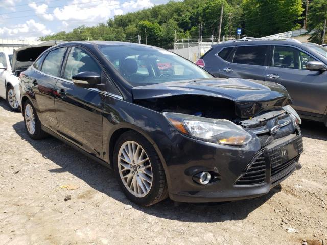 1FADP3J20EL234777 - 2014 FORD FOCUS TITANIUM BLACK photo 4