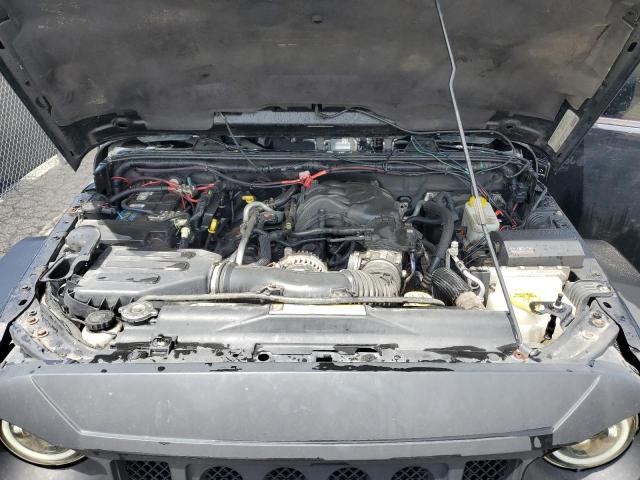 1C4BJWEG4CL120370 - 2012 JEEP WRANGLER U SAHARA BLACK photo 12