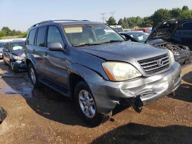 JTJBT20X440050993 - 2004 LEXUS GX 470 GRAY photo 4