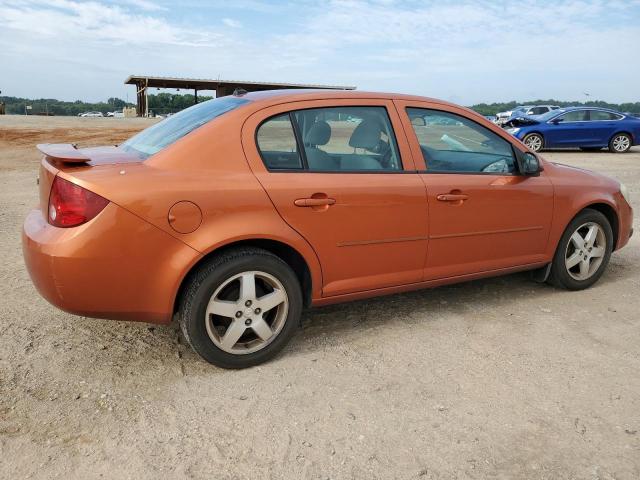 1G1AL54F257532073 - 2005 CHEVROLET COBALT LS ORANGE photo 3