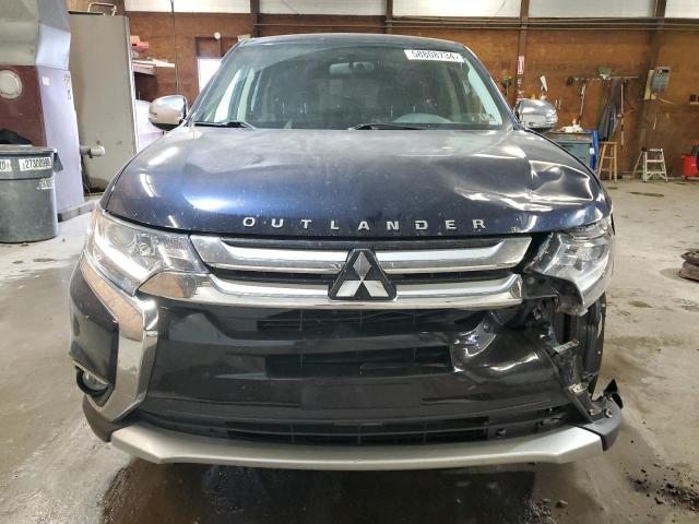 JA4AZ3A39JZ071404 - 2018 MITSUBISHI OUTLANDER SE BLUE photo 5