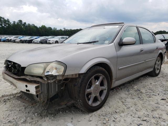 JN1CA31D01T820725 - 2001 NISSAN MAXIMA GXE BEIGE photo 1