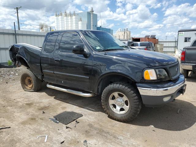 1FTRX18L4YNB68780 - 2000 FORD F150 BLACK photo 4