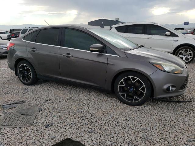 1FAHP3J29CL195153 - 2012 FORD FOCUS TITANIUM GRAY photo 4