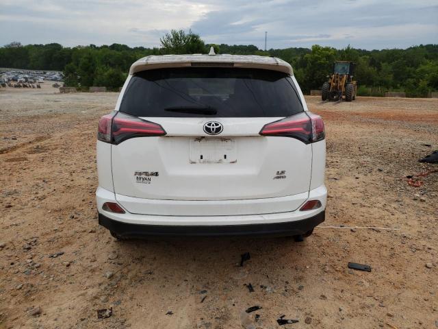 JTMBFREV0JD250249 - 2018 TOYOTA RAV4 LE WHITE photo 6