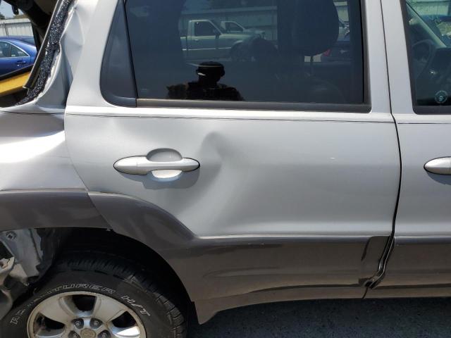 4F2CZ96154KM03179 - 2004 MAZDA TRIBUTE ES 银色 照片 11