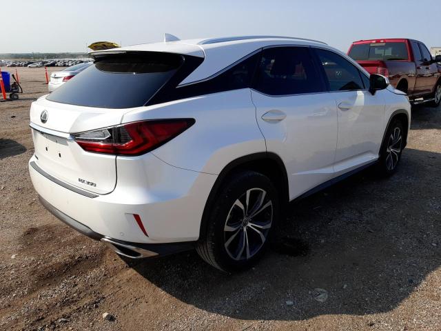 2T2ZZMCA1JC113239 - 2018 LEXUS RX 350 BASE WHITE photo 4