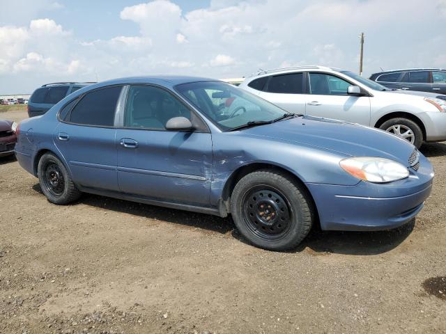 1FAFP52U2YG204133 - 2000 FORD TAURUS LX BLUE photo 4