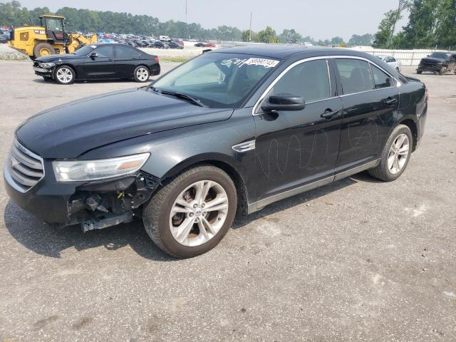 1FAHP2E82EG110304 - 2014 FORD TAURUS SEL BLACK photo 1