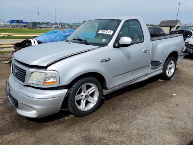 2FTRF073X4CA27064 - 2004 FORD F150 SVT LIGHTNING SILVER photo 1