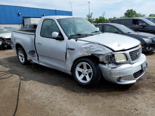 2FTRF073X4CA27064 - 2004 FORD F150 SVT LIGHTNING SILVER photo 4