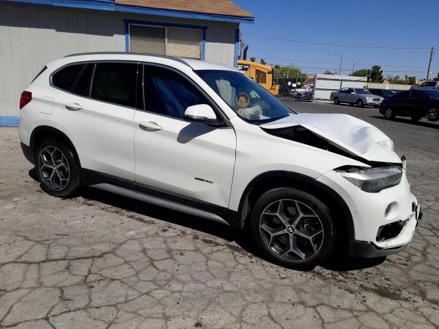 WBXHU7C37H5H36895 - 2017 BMW X1 SDRIVE28I WHITE photo 4