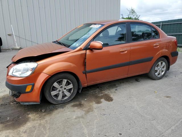 KNADE223996546860 - 2009 KIA RIO BASE ORANGE photo 1