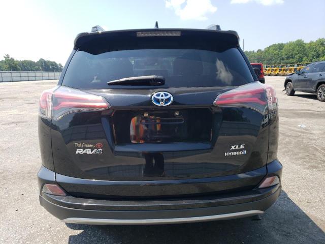 JTMRJREV3JD157187 - 2018 TOYOTA RAV4 HV LE BLACK photo 6