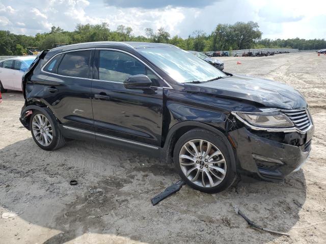 5LMCJ3C94HUL03401 - 2017 LINCOLN MKC RESERVE BLACK photo 4