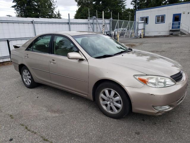 JTDBE32K640273105 - 2004 TOYOTA CAMRY LE TAN photo 4