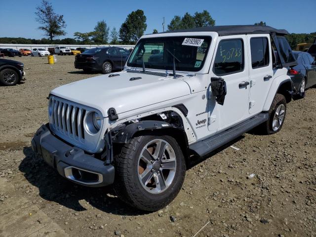 1C4HJXEG4JW142168 - 2018 JEEP WRANGLER U SAHARA WHITE photo 2