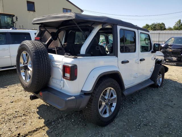 1C4HJXEG4JW142168 - 2018 JEEP WRANGLER U SAHARA WHITE photo 4