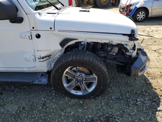 1C4HJXEG4JW142168 - 2018 JEEP WRANGLER U SAHARA WHITE photo 9