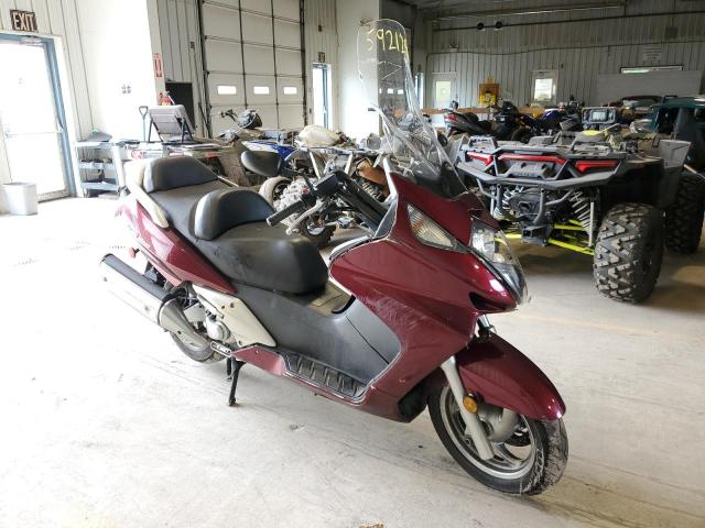 JH2PF01199K700676 - 2009 HONDA FSC600 D BURGUNDY photo 1