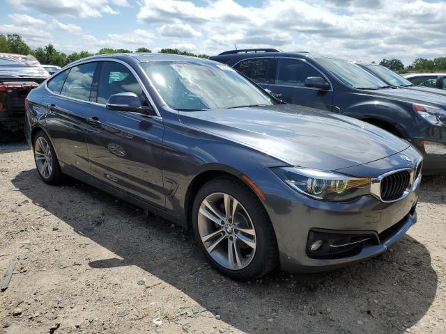 WBA8Z9C55JB220080 - 2018 BMW 330 XIGT GRAY photo 4